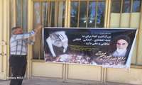نصب بنر به مناسبت ارتحال امام خمینی